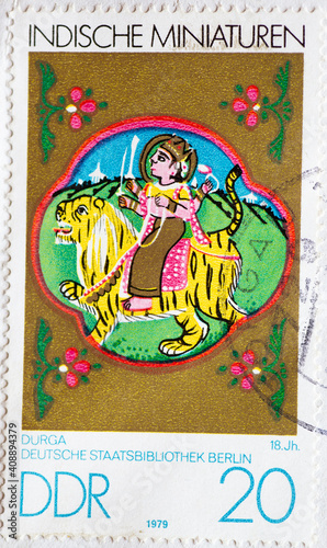 GERMANY, DDR - CIRCA 1979 : a postage stamp from Germany, GDR showing an Indian miniatures: Durga (18th century)
