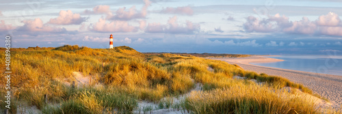 Lighthouse at the dunes beach on the island of Sylt, Schleswig-Holstein, Germany