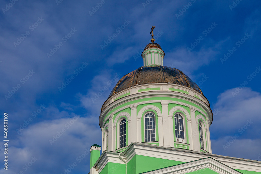 The gilded dome of the Church of the Life-Giving Trinity in the city of Ozyory (Moscow region, Russia)