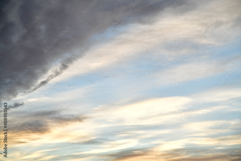 Fototapeta premium pre-sunset view of the sky with dark silhouettes of houses