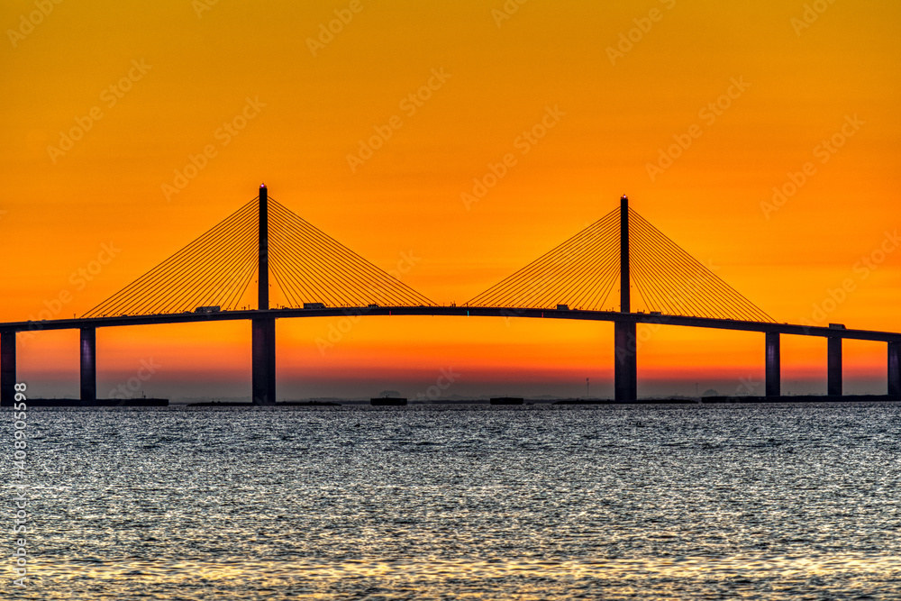 Sunrise behind bridge