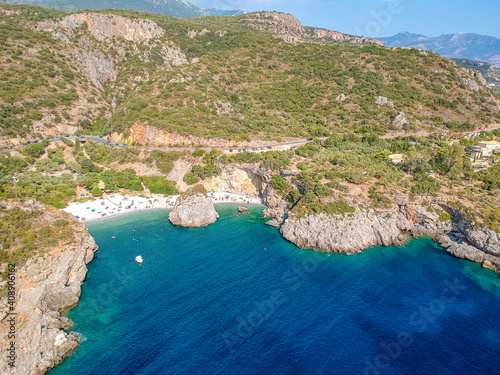 Aerial view of the famous rocky beach Foneas near Kardamyli village in the seaside Messenian Mani area during high tourist Summer period. Messenia, Peloponnese, Greece. photo