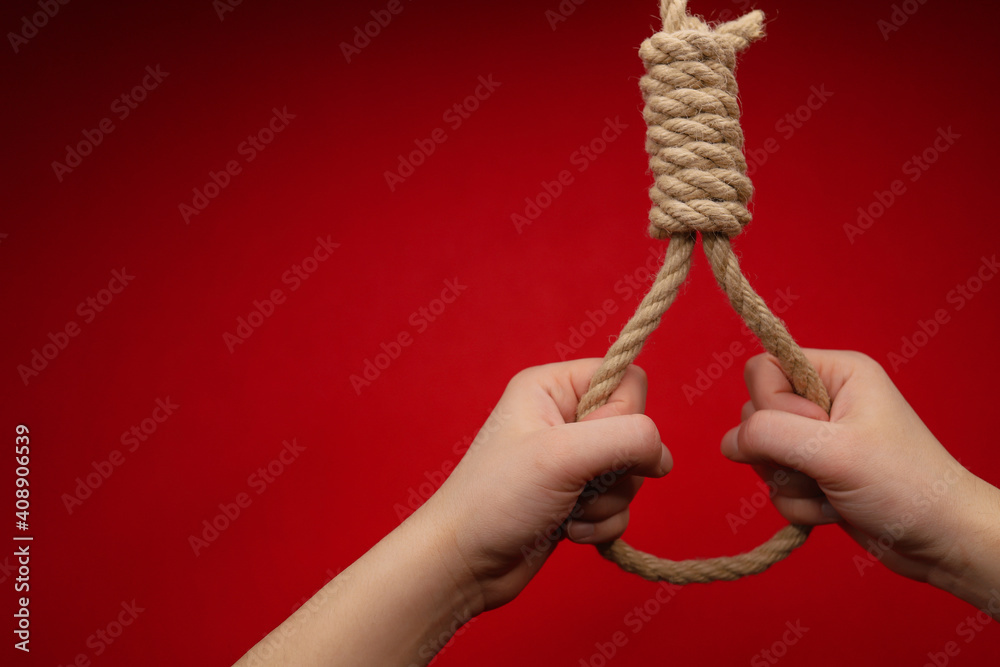hands hold the hanging Lynch's loop