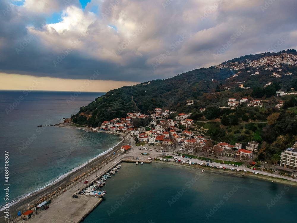 Aerial view of the coastal seaside village Loutraki and the port located in Glossa during winter period. Skopelos island, Sporades, Greece