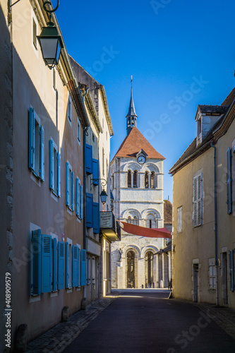 Fototapeta Naklejka Na Ścianę i Meble -  View on carolingian church and the streets of Ebreuil, a small village in Auvergne, France