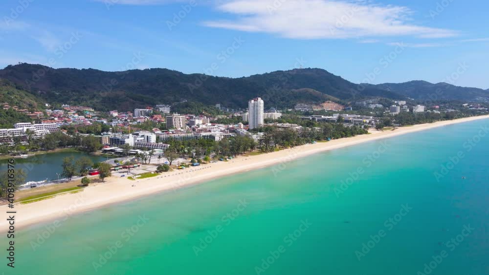 High angle view Aerial view. Scene of Beach sea sand and cityscape at beach in sunny summer day. Mountain and sky with cloud background, At Karon Beach, Phuket, Thailand. On 20 Jan, 2021 High angle view Aerial view. Scene of Beach sea sand and cityscape at beach in sunny summer day. Mountain and sky with cloud background, At Karon Beach, Phuket, Thailand. On 20 Jan, 2021