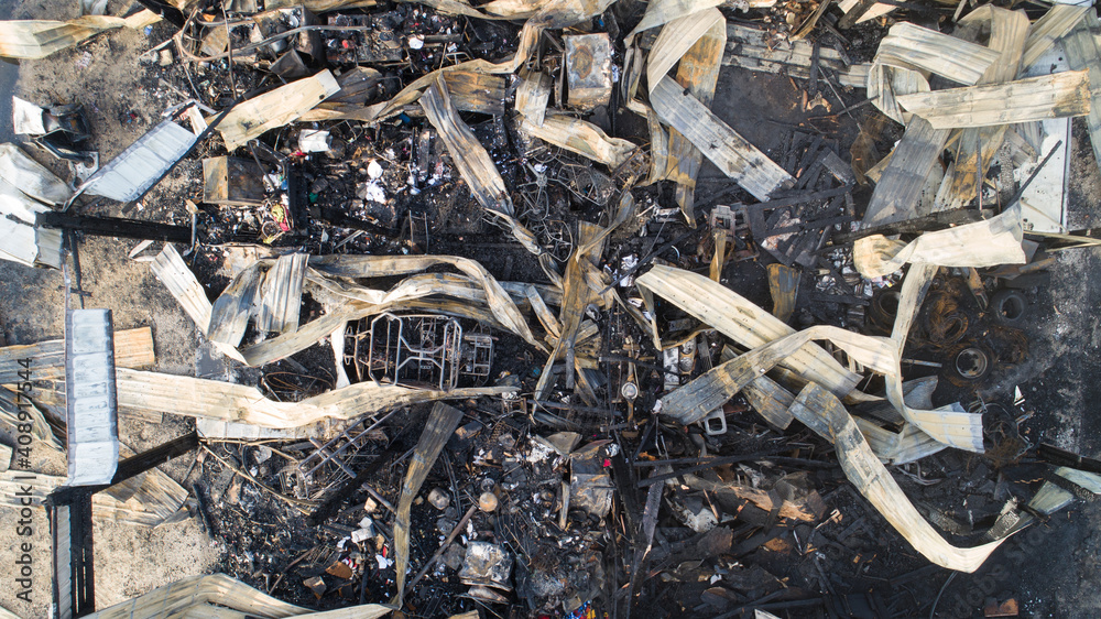 aerial view looking down of a burned building aerial view looking down of a burned building