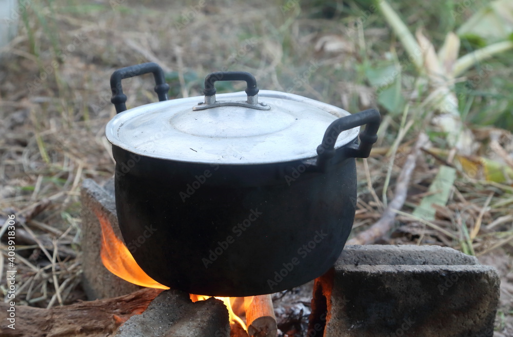 Cooking with pots on the stove Cooking with pots on the stove