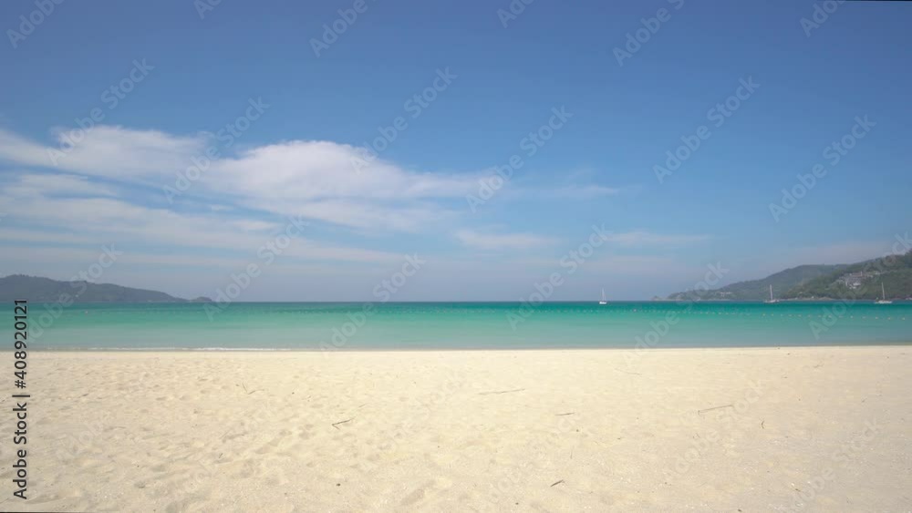 Phuket beach sea sand and sky. Landscape view of beach sea in summer day. Beach space area. At Karon Beach, Phuket, Thailand. On 15 June 2020. 4K UHD. Video Clip Phuket beach sea sand and sky. Landscape view of beach sea in summer day. Beach space area. At Karon Beach, Phuket, Thailand. On 15 June 2020. 4K UHD. Video Clip