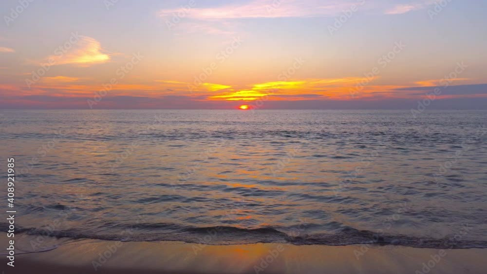 Sunset in the sea. Scene of Beautiful sunset to sea water in Twilight. Golden sky background. Sunset in the sea. Scene of Beautiful sunset to sea water in Twilight. Golden sky background.