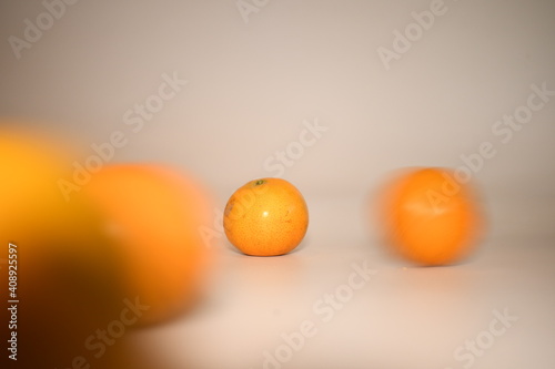 fresh orange on the white table background