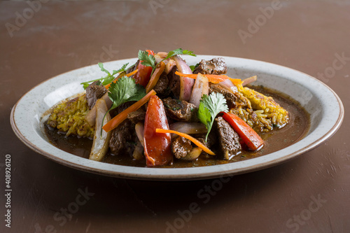 Comida peruana, criolla. Tacu Tacu de Lomo Saltado.