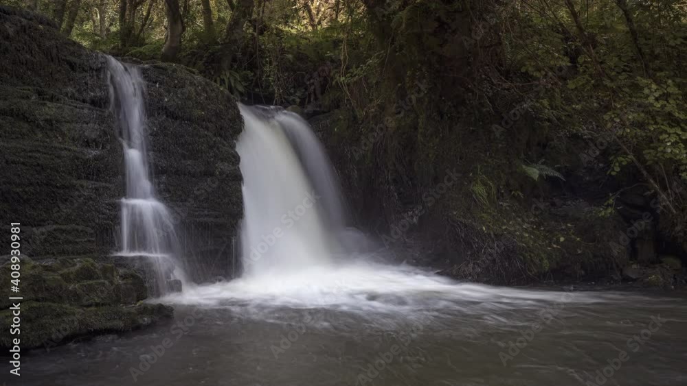 Time lapse of forest waterfall in rural landscape during autumn in Ireland. Time lapse of forest waterfall in rural landscape during autumn in Ireland.