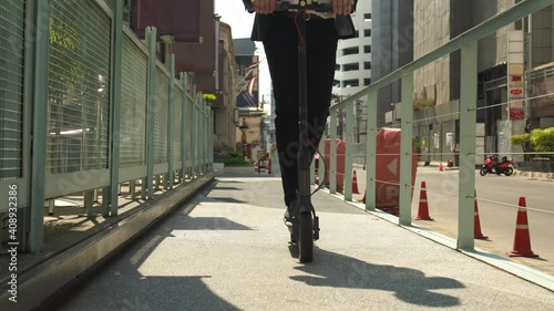 Wallpaper Mural men business with scooter. asian business office worker, lifestyle men urban. Torontodigital.ca