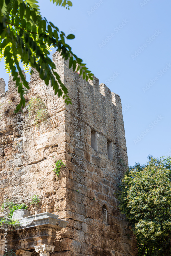 Old stone roman fortress and empty blue sky