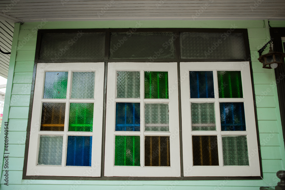Old windows made of colored glass are popular in Thailand.