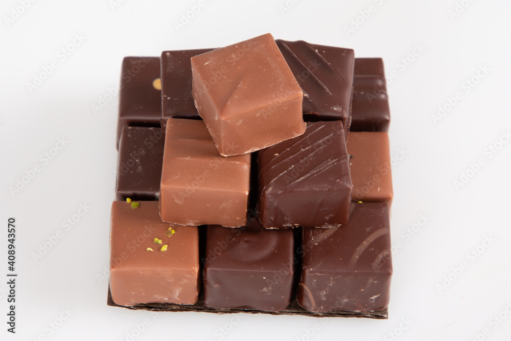 variety fine artisanal chocolate pralines in pyramid view in white background variety fine artisanal chocolate pralines in pyramid view in white background