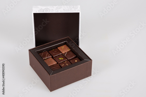 Assortment of fine milk black artisanal chocolate candies in small gift box © OceanProd