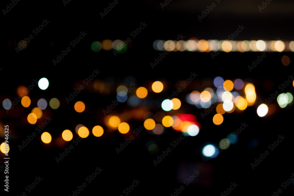 Night city lights in blur of bokeh style background