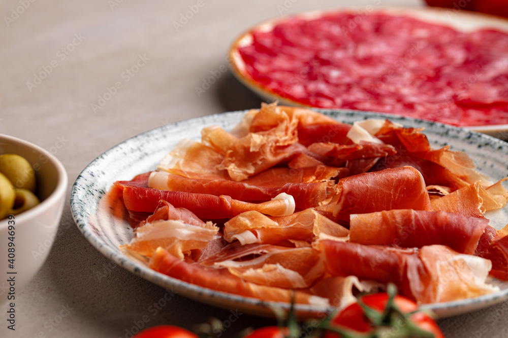 Delicious meat slicing on plate close up Delicious meat slicing on plate close up