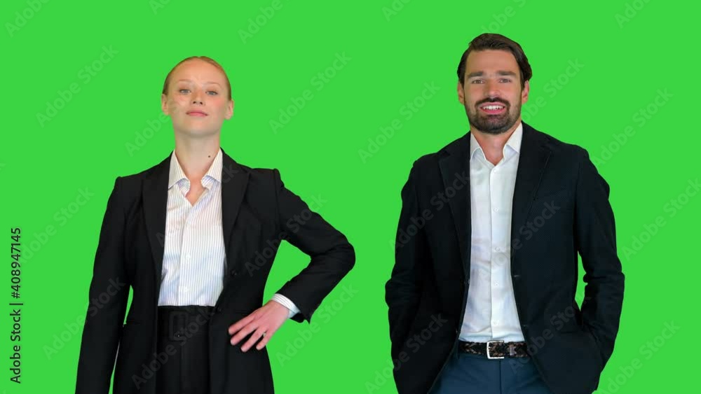 Businessman And Businesswoman Shaking Hands on a Green Screen, Chroma Key. Businessman And Businesswoman Shaking Hands on a Green Screen, Chroma Key.