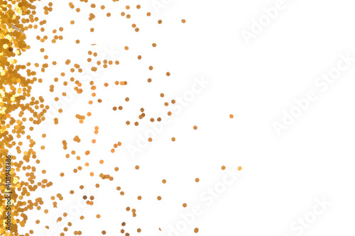 Bright golden confetti on white background, top view