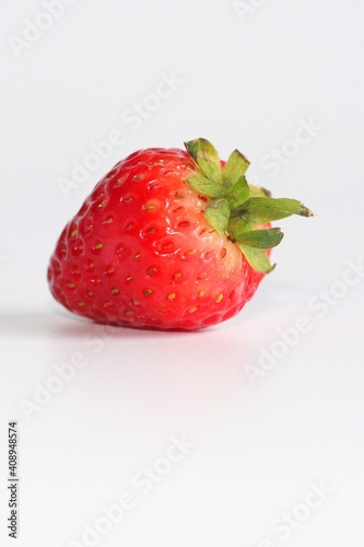 A ripen strawberry isolated on white background