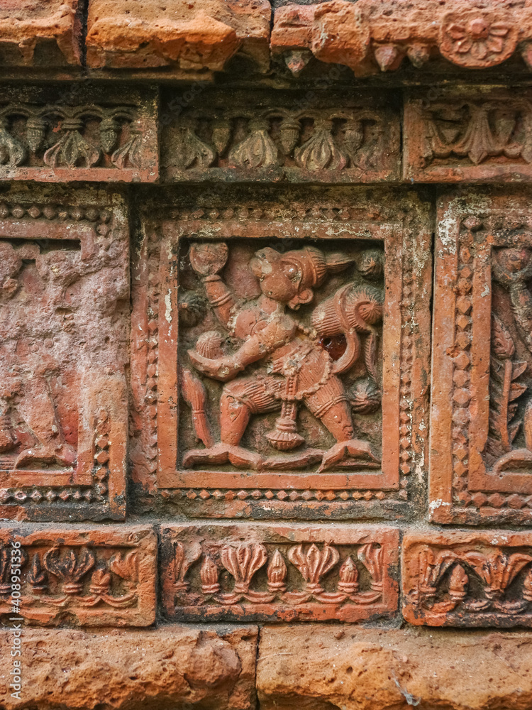 Carved terracotta detail of Ramayana scene with monkey on beautiful ancient temple in Puthia, Rajshahi district, Bangladesh