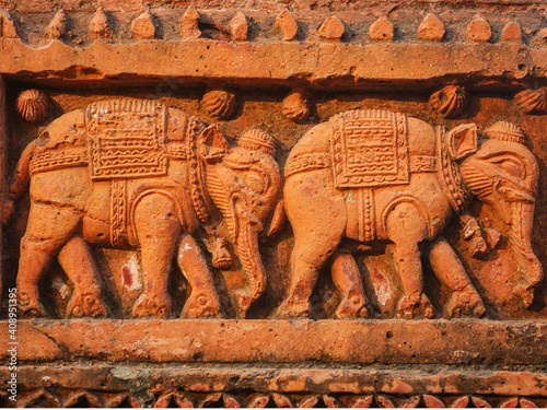 Closeup detail of elephants terracotta carving on beautiful ancient Govinda temple in Puthia, Rajshahi district, Bangladesh photo