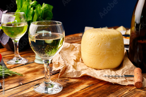 Head of cheese on brown wooden table