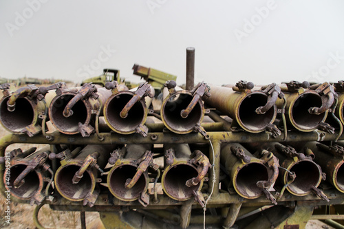 Old armoured vehicles military escorts, guns and tanks in Gardez in Afghanistan photo