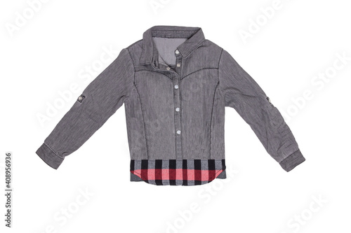 Clothes for children. Close-up of a beautiful gray and black sporty blouse for girl with colorful checkered pattern. Children spring and summer fashion. Front view.