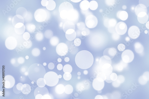 Abstract festive gradient light blue gray silver bokeh background texture with white bokeh lights. Beautiful backdrop with space for christmas, invitation or other holidays.