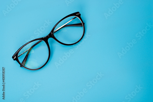 glasses on blue background