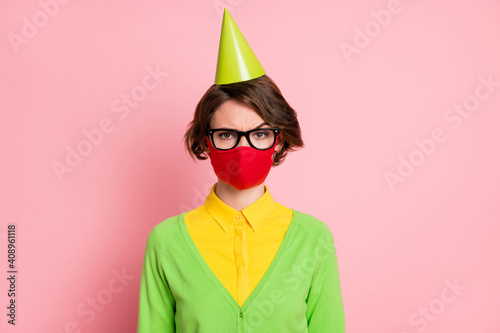 Photo of beautiful brunette girl wear mask raise eyebrow pandemic news isolated on pastel pink color background photo