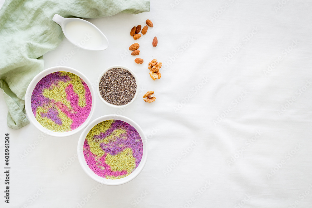 Breakfast smoothie bowles with chia seeds and strawberries, top view