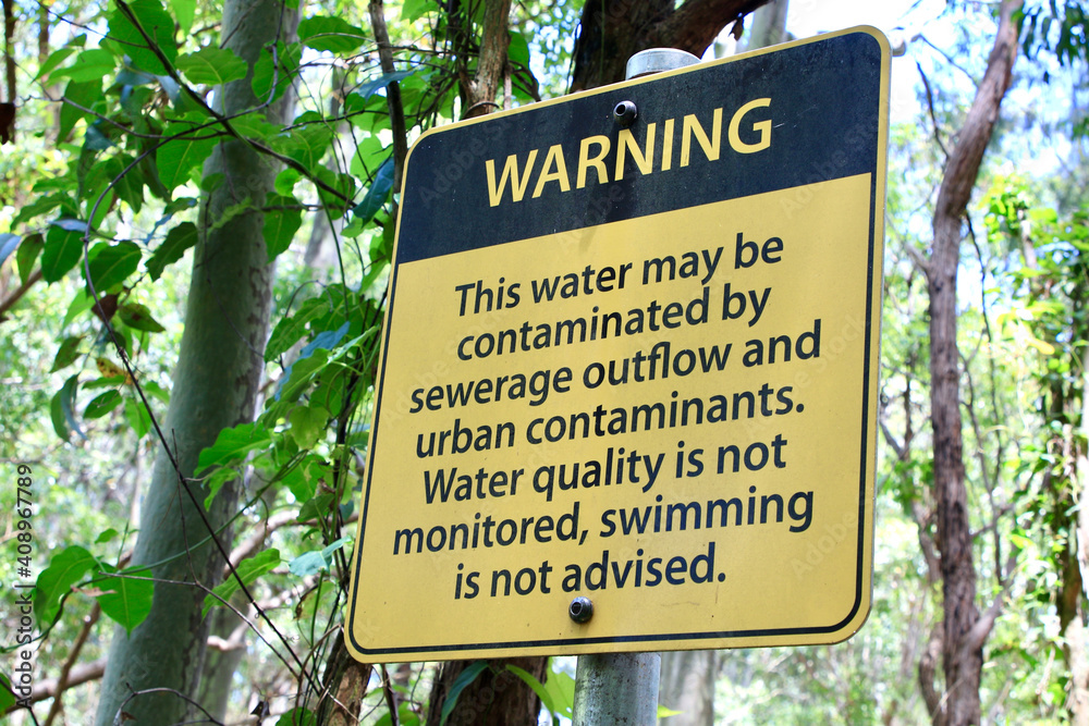 Warning sign contaminated water, do not drink. Stock Photo Adobe Stock