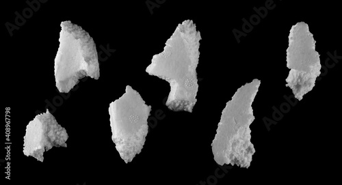 Styrofoam pieces, broken chunks set and collection isolated on black background with clipping path, top view