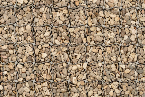 Gray coarse pebbles in cells