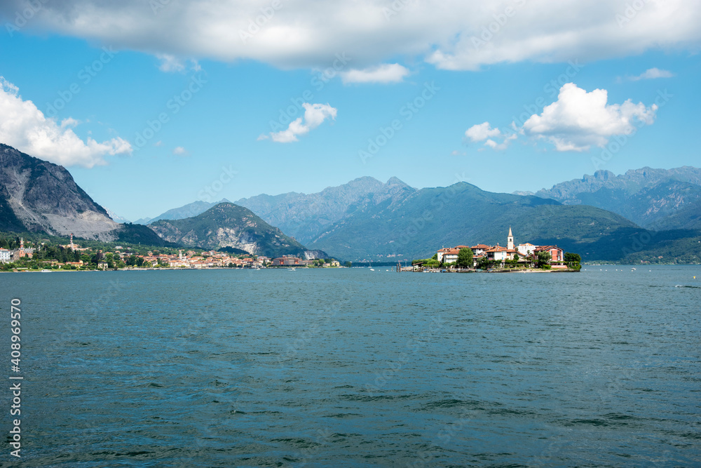 Island and mountain (Fishermen's Island) on lake Maggiore, Baveno, Italy. Panoramic view of mountains and lake.