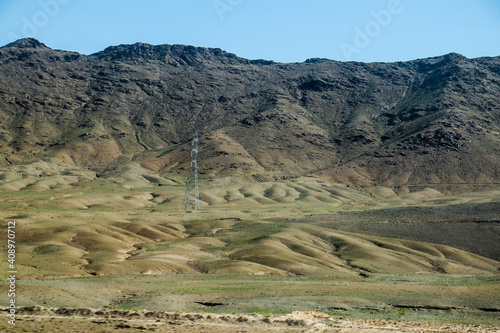 Old armoured vehicles military escorts, guns and tanks in Gardez in Afghanistan photo