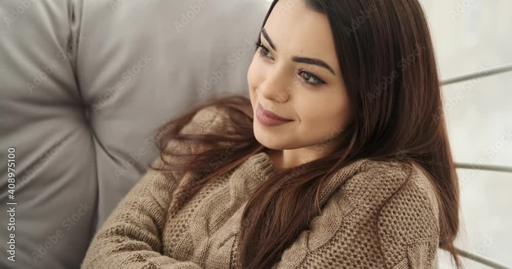 Beautiful young woman smiling at home Beautiful young woman smiling at home