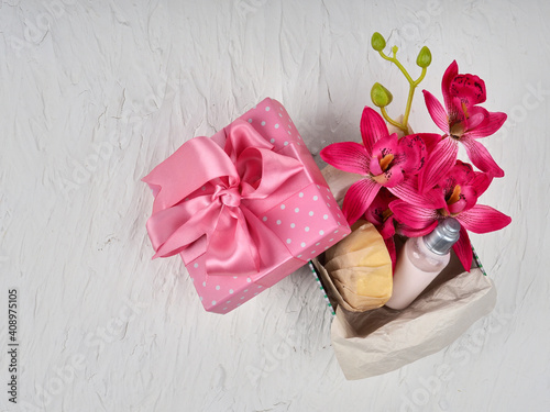 Fototapeta Naklejka Na Ścianę i Meble -  gift box with cosmetics on the theme of Valentine's day, birthday and wedding