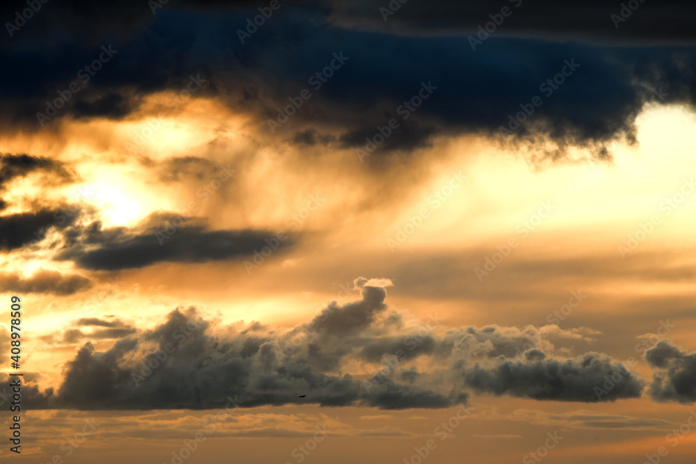 dramatic sunset sky with stormy clouds