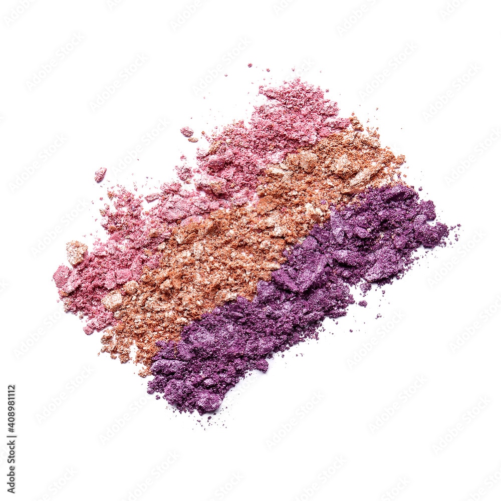 Different crushed eyeshadows on white background