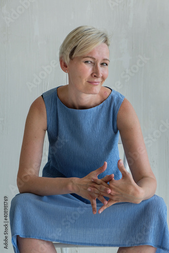 mid adult woman posing emotion in studio photo