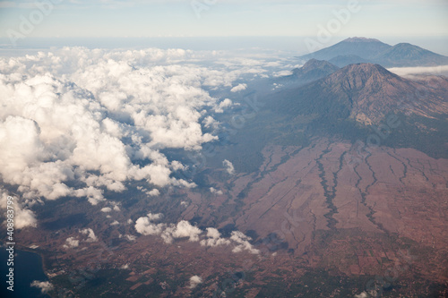 Mountain peaks of Indonesia, the view from the plane. Volcanoes of Indonesia, view from the plane.
