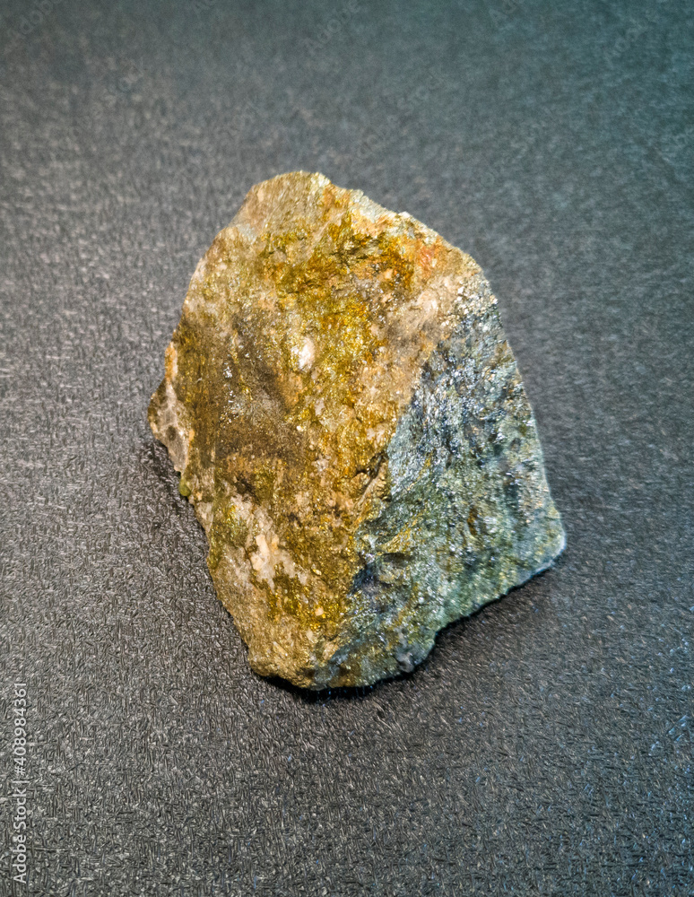 the mineral is a stone chip with yellow inclusions the mineral is a stone chip with yellow inclusions
