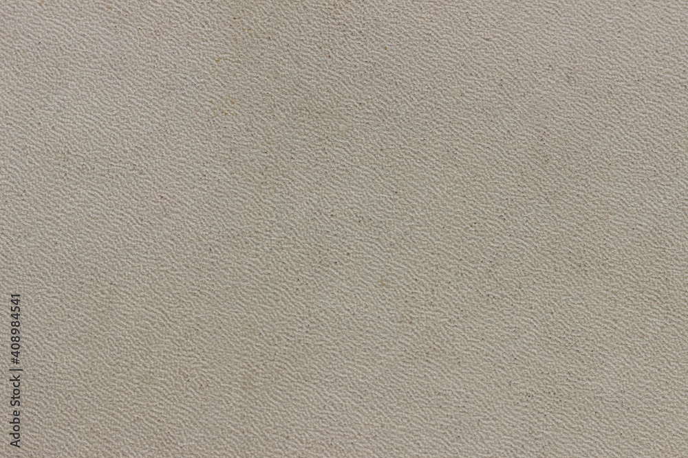 The surface of the brown old worn dermatin with a small pattern. The surface of the brown old worn dermatin with a small pattern.