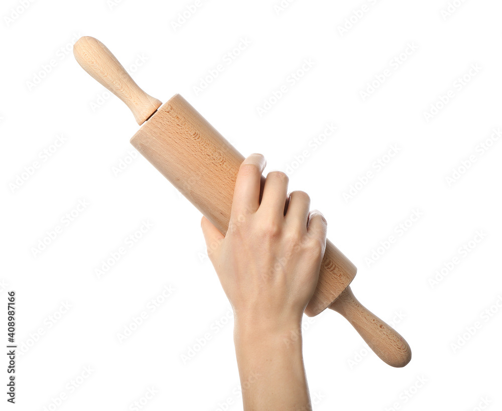 Female hand with rolling pin on white background Female hand with rolling pin on white background